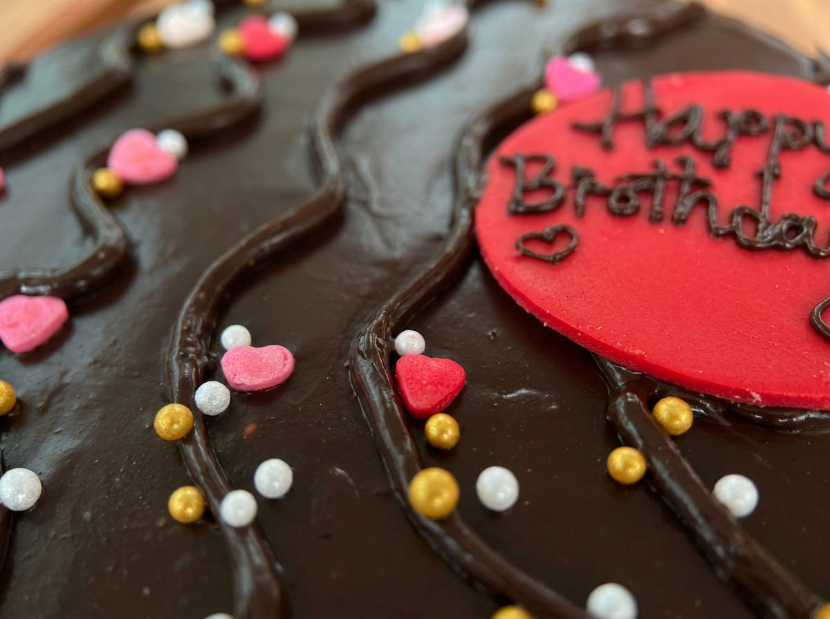 Chocolate & Hearts Birthday Cake — closeup view