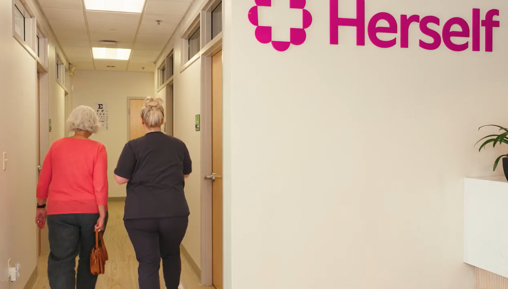 MA leading patient to appointment room