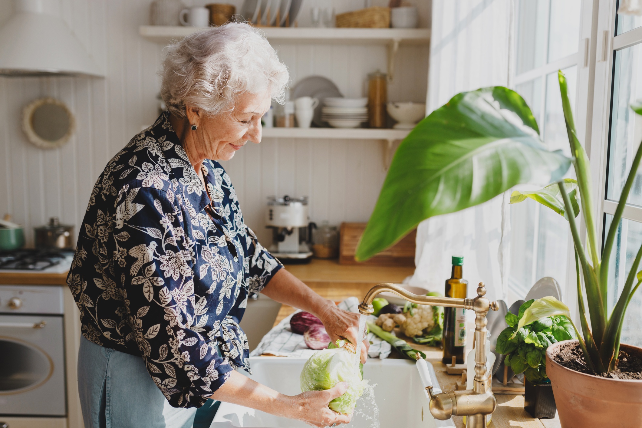 Woman 60 and up making healthy food