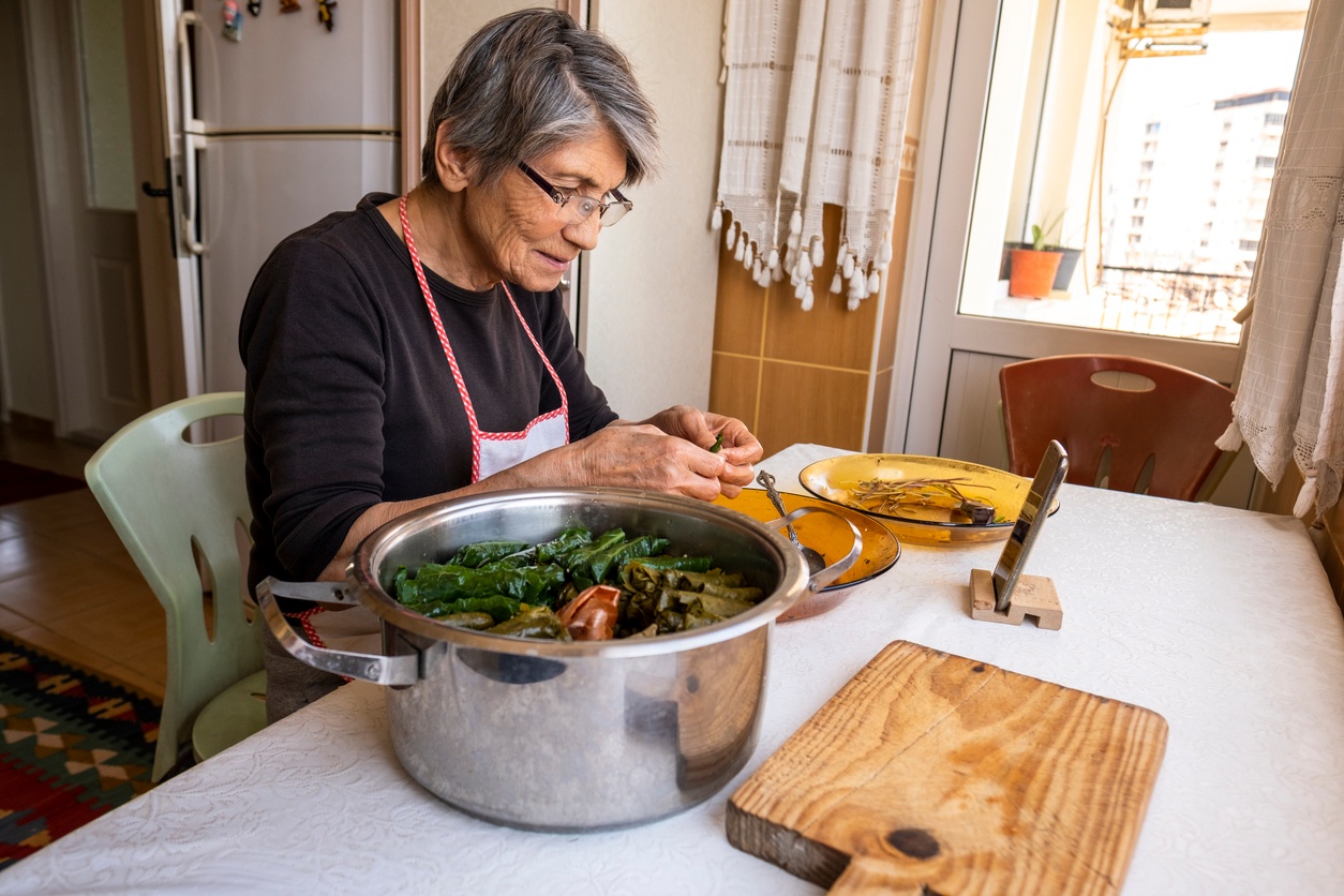 Woman 60 and up eating healthy food for her heart