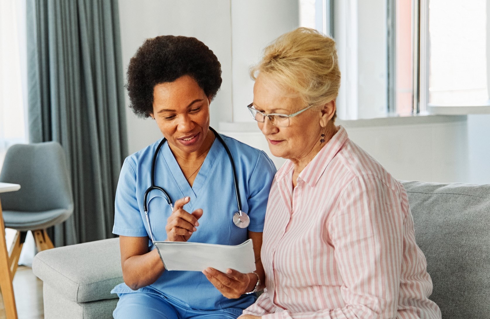 Woman 60+ talking to provider about UTIs