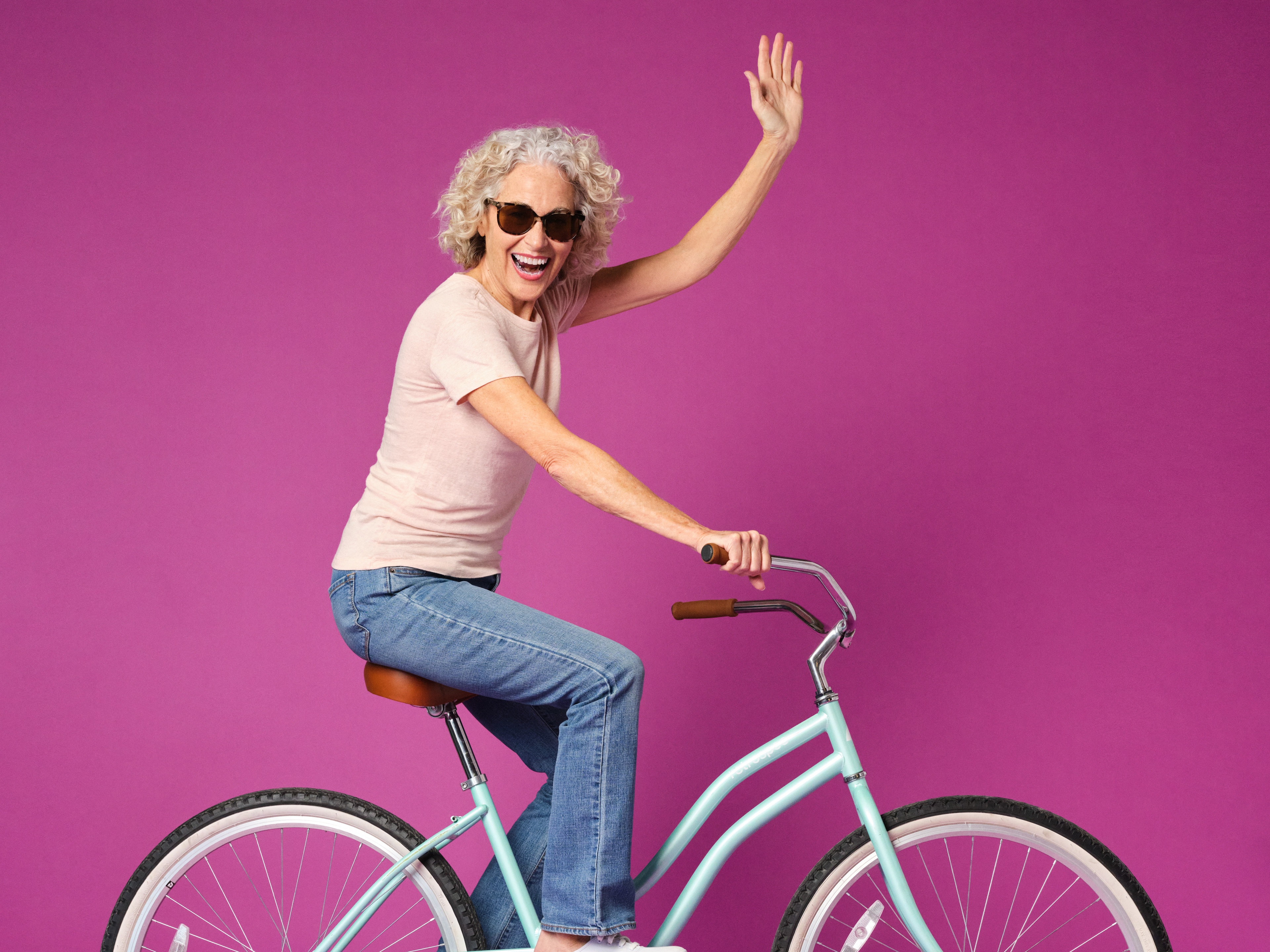 Woman above 60 going for a bike ride