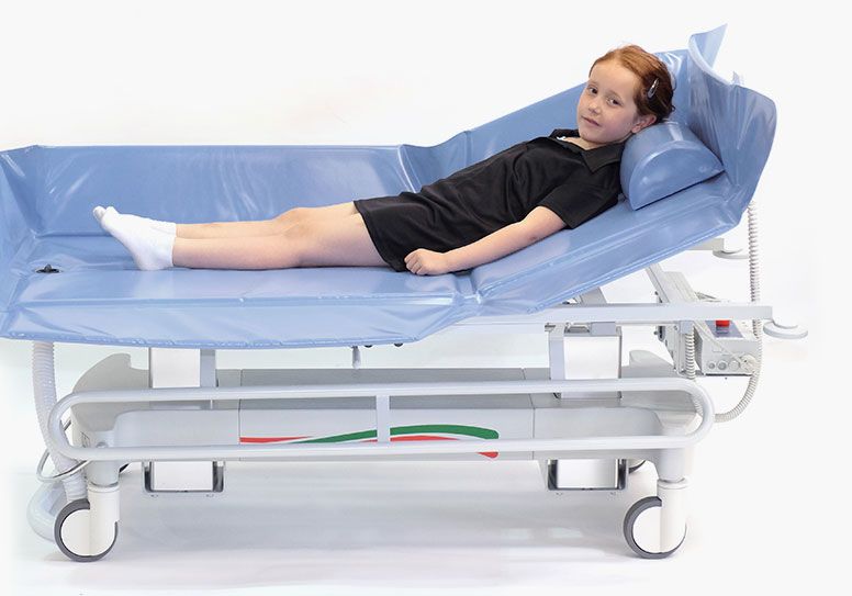 Height adjustment on Timo Paediatric Shower Trolley
