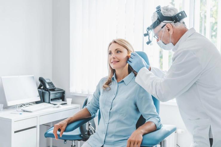 Female patient visiting an audiologist