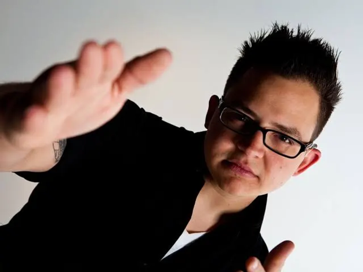 Sean Forbes performing sign language, deaf rapper and musician known for blending hip hop with visual storytelling