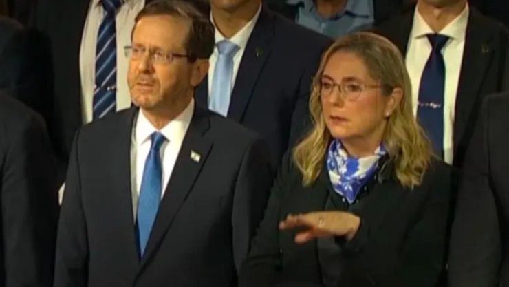 Michal Herzog, Israel’s First Lady, using Israeli Sign Language (ISL) during the Holocaust Remembrance ceremony at Yad Vashem in Israel.
