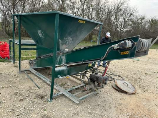 2 yard capacity, Cement bag breaker, 77” Material load-over height, 13 HP engine, 18” wide dual-ply conveyor belt, Digital water meter (re-settable), ¾” galvanized and stainless steel plumbing system, 10 gauge steel hopper, 8” conveyor drive pulleys, , 164” long x 64” wide x 77” tall