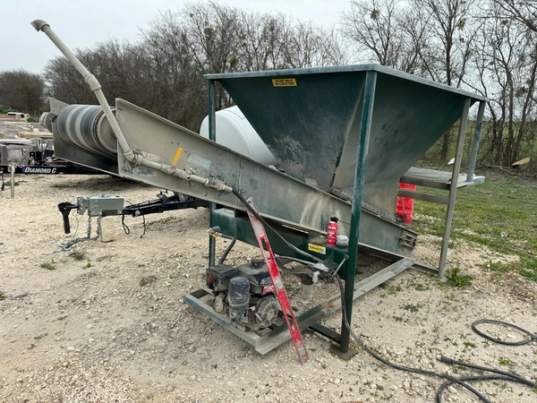 2 yard capacity, Cement bag breaker, 77” Material load-over height, 13 HP engine, 18” wide dual-ply conveyor belt, Digital water meter (re-settable), ¾” galvanized and stainless steel plumbing system, 10 gauge steel hopper, 8” conveyor drive pulleys, , 164” long x 64” wide x 77” tall