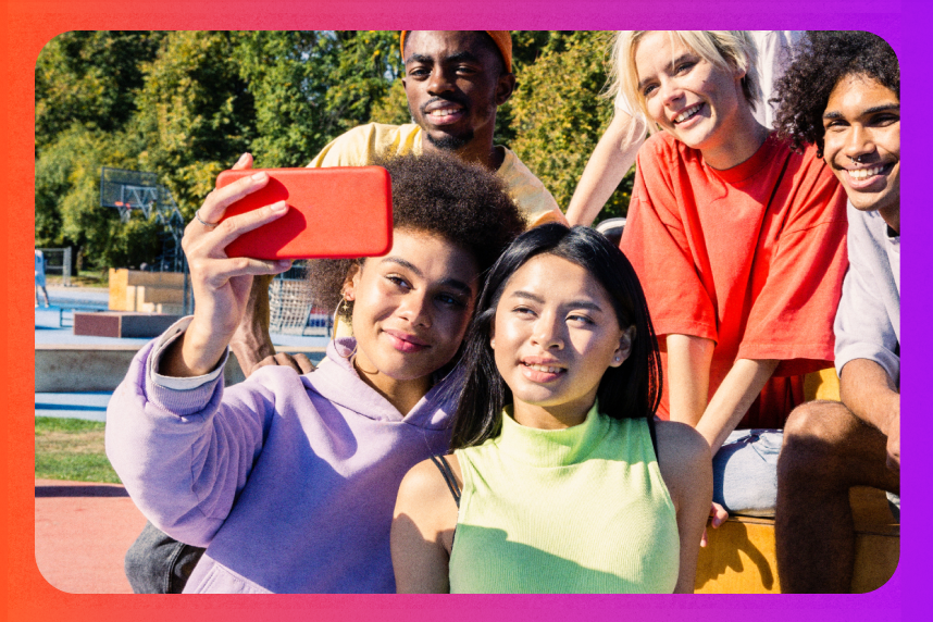 Group of young people taking a selfie with a smart phone