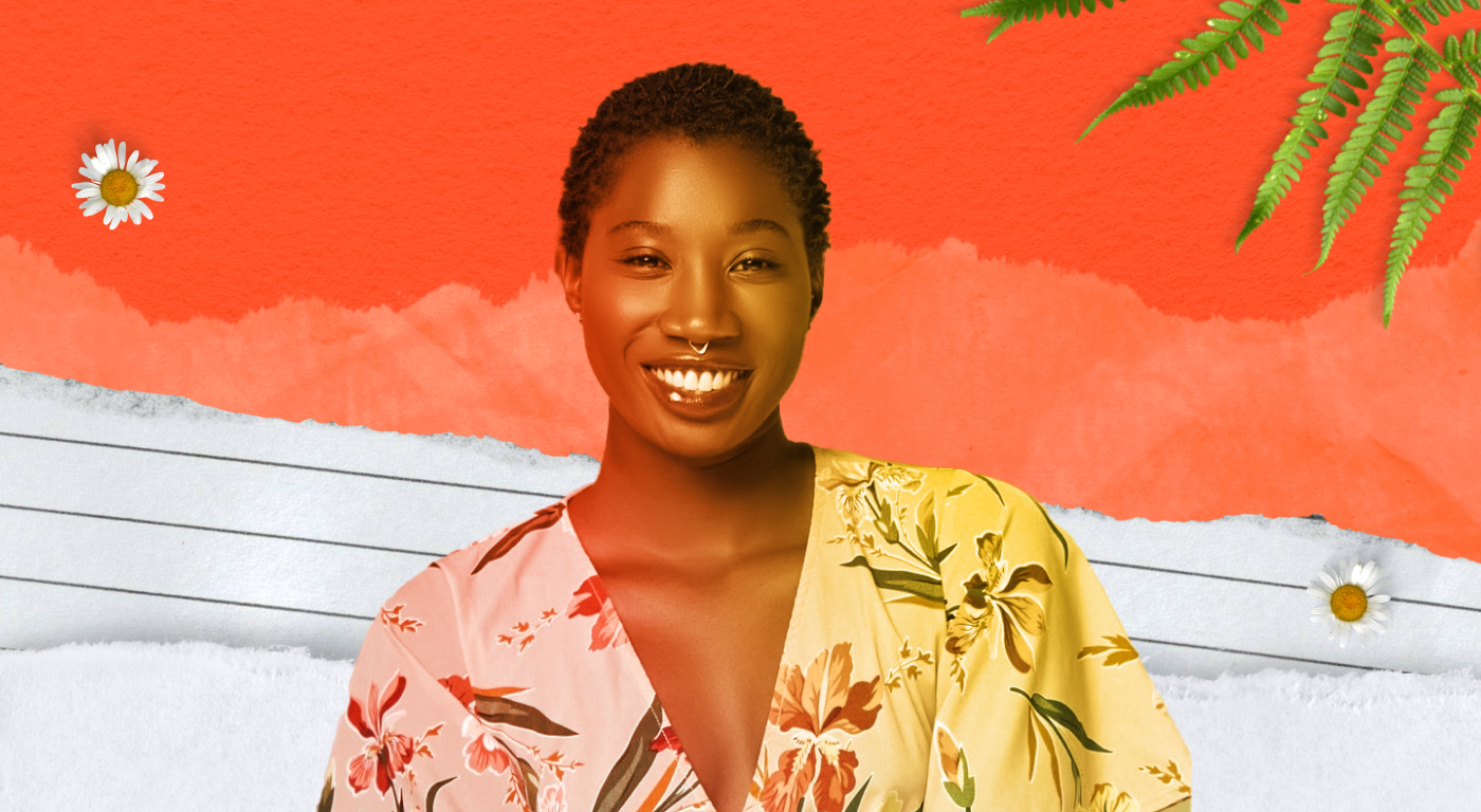 Pierra D. Brown with short hair, septum ring, and floral top looking straight out with a beaming smile, on an abstract warm gradient background