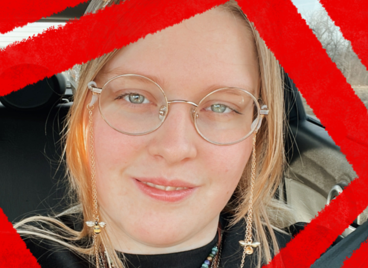 A smiling individual wearing round glasses and multiple colorful necklaces, seated in a car. This image represents the spirit of volunteerism and community involvement through civic learning and leadership opportunities.