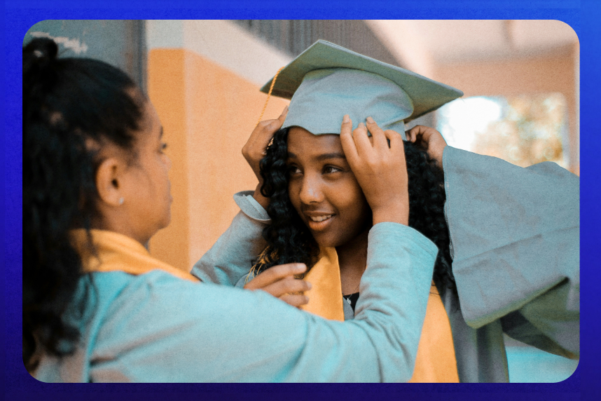 Person putting on a grad cap