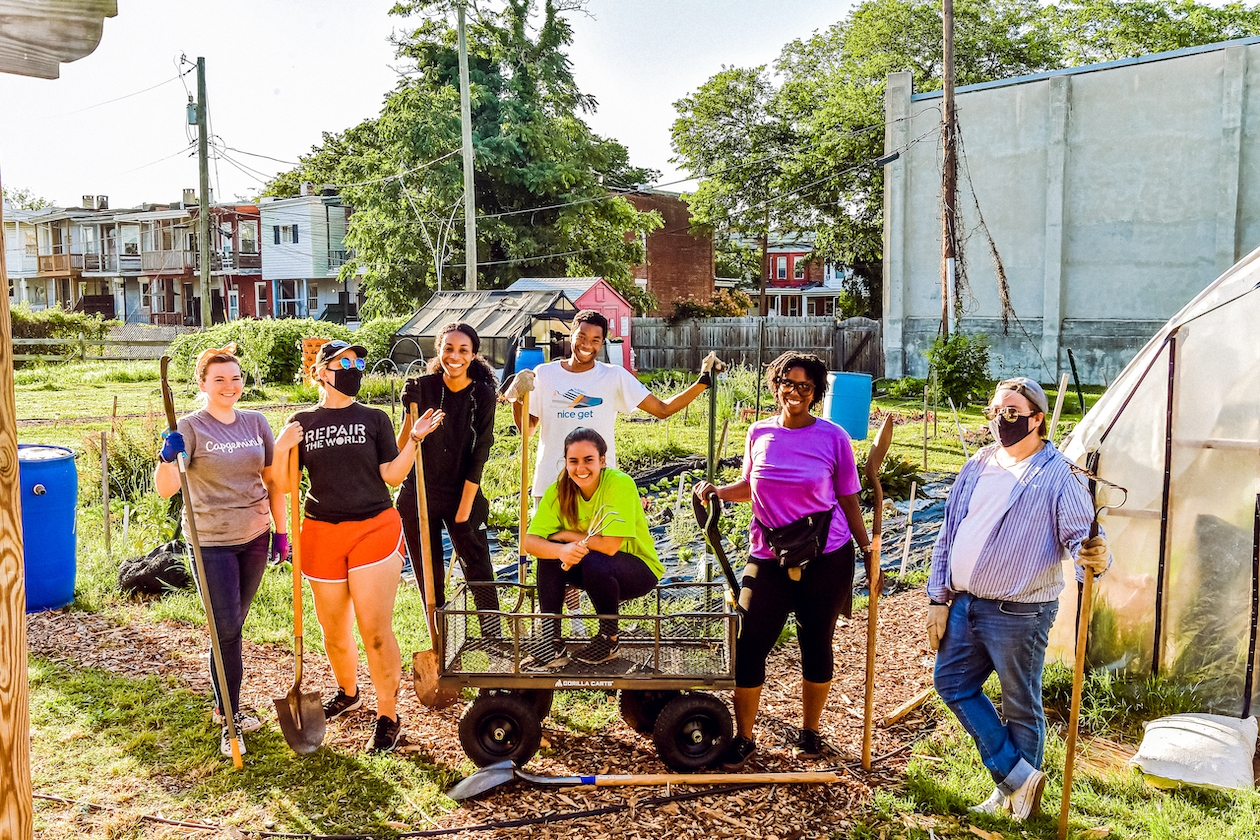 Repair the World Volunteers in service at a farm