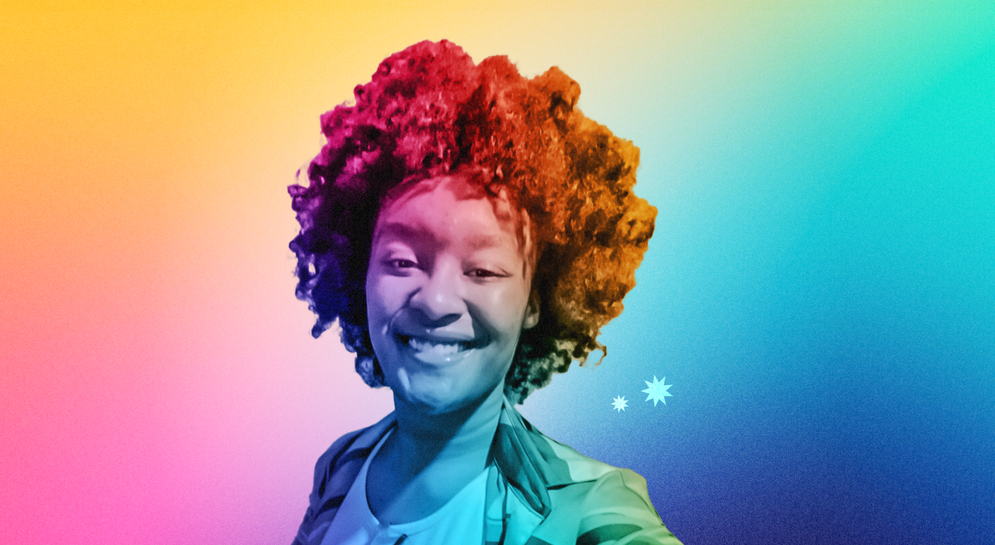 Jasmine Lewis with natural hair and beaming smile looking straight oout, on an abstract color gradient background