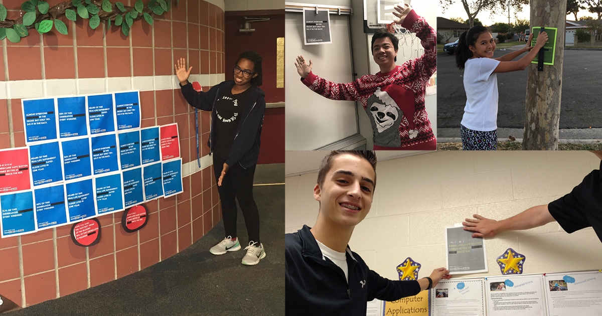 Four individuals engaged in community service, displaying informational boards and programming materials. The image highlights volunteer opportunities and civic engagement, showcasing diverse participation in leadership activities.