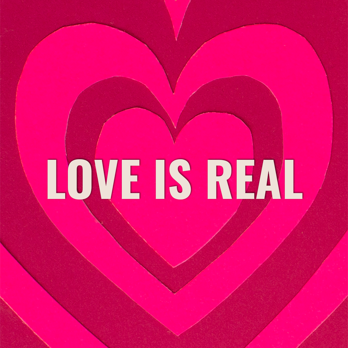 A vibrant display of layered paper hearts in shades of pink, centered around the bold text 'LOVE IS REAL.' This image promotes themes of community engagement, volunteer opportunities, and the significance of love and connection.