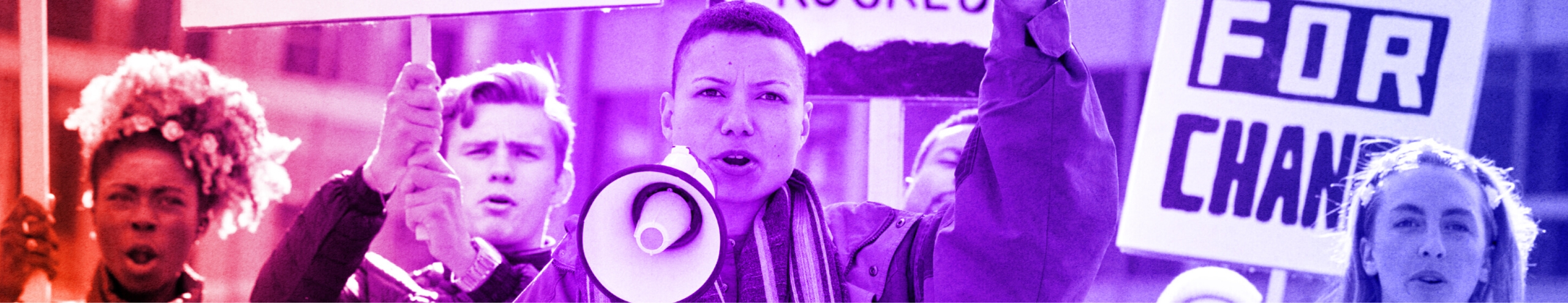 Two young activists with a megaphone partake in peaceful protest