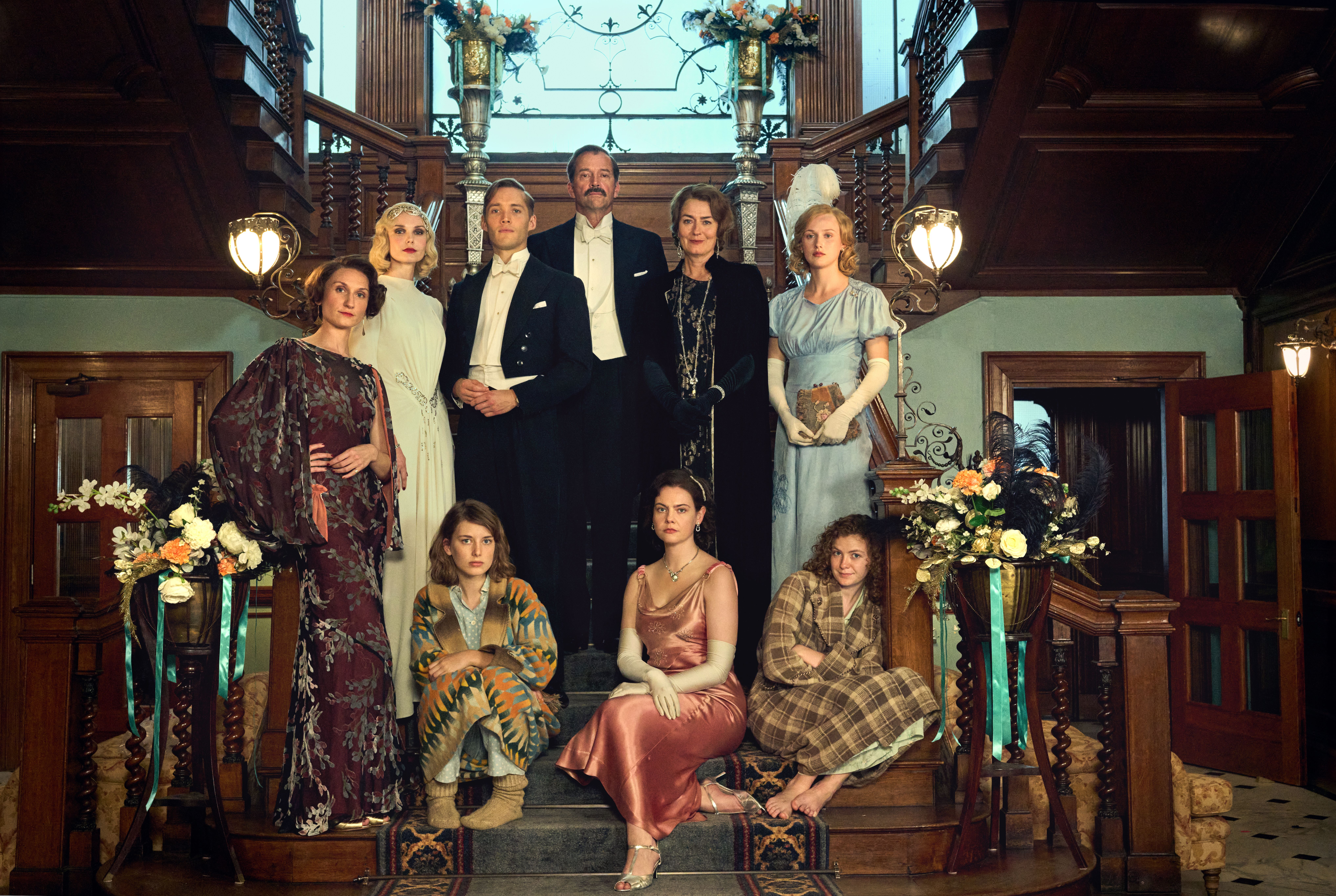 Picture shows: (Standing L-R) Bessie Carter as Nancy Mitford, Joanna Vanderham as Diana Mitford, Toby Regbo as Tom Mitford, James Purefoy as Farve, Anna Chancellor as Muv, Shannon Watson as Unity Mitford (Seated L-R) Zoe Brough as Jessica Mitford, Isobel Jesper Jones as Pam Mitford and Orla Hill as Debo Mitford