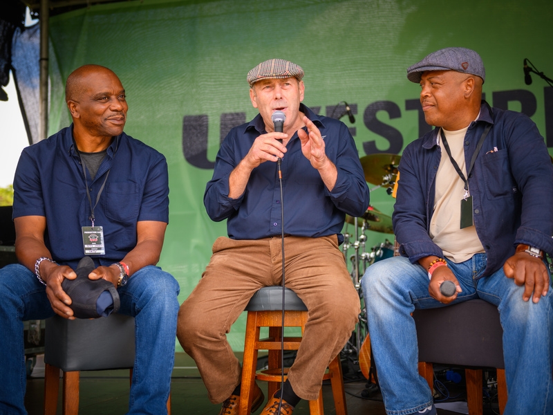 Peter Harriot, Derek Mathewson and Sheldon Nichols talking on stage