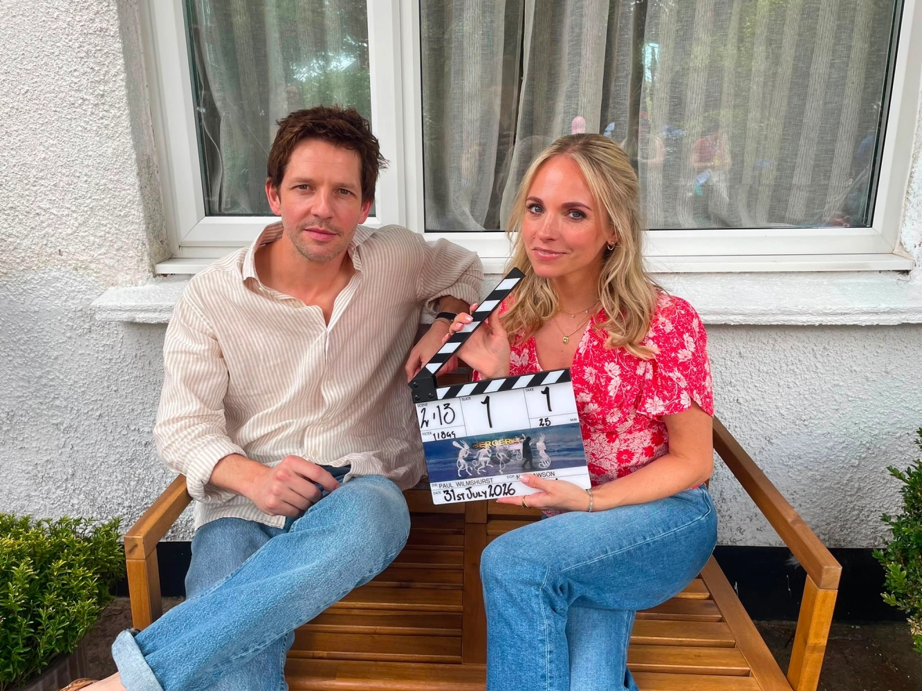 Damien Molony and Georgia Tennant on set for Bergerac S3 with a clapperboard