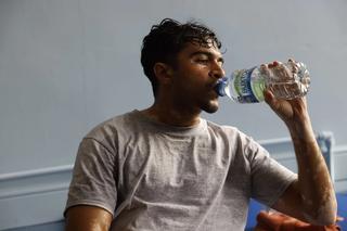 Man drinking buxtons
