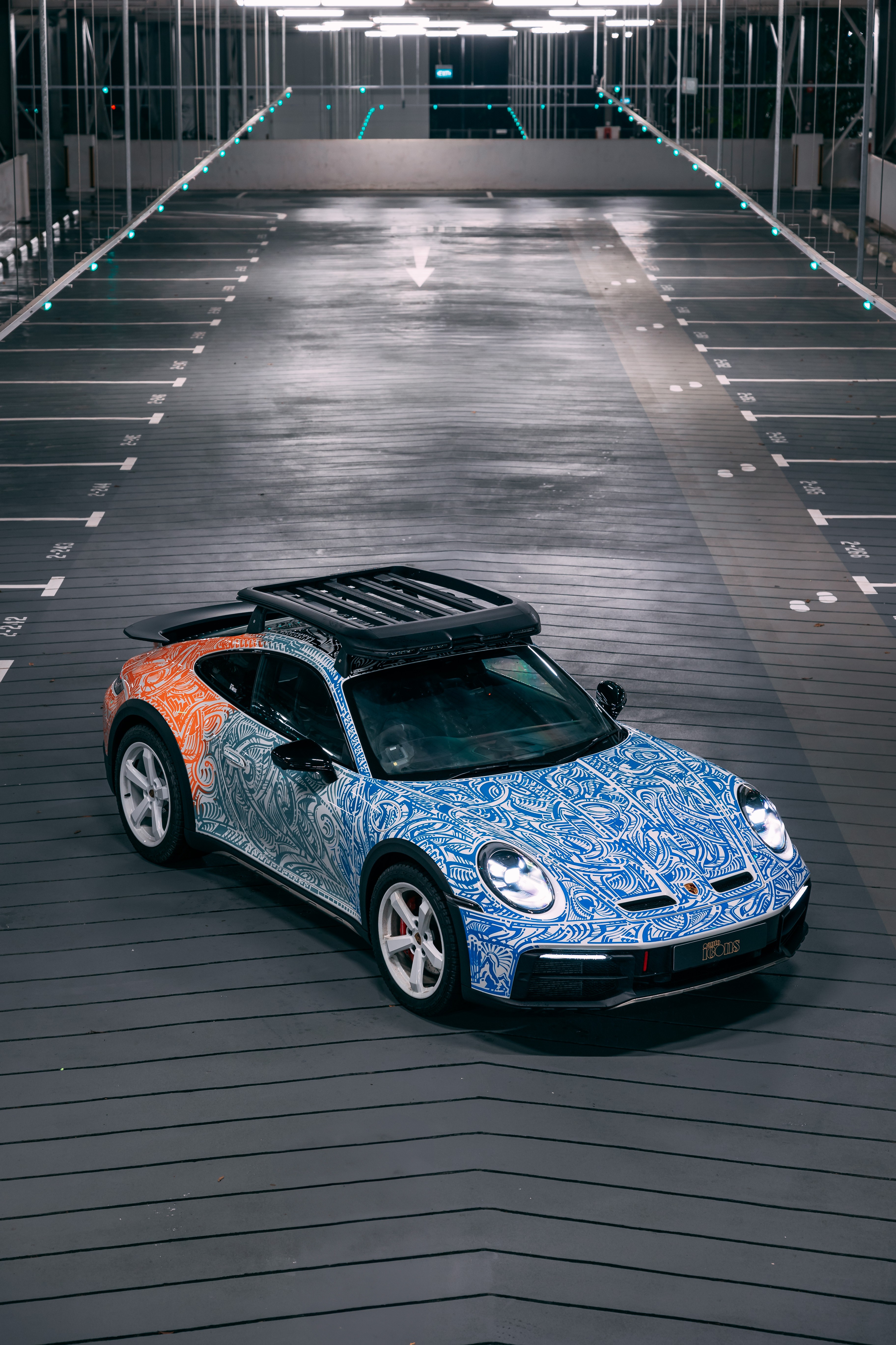 Porsche 911 DakarT painted by Chris Dunlop brought by Auto Icons