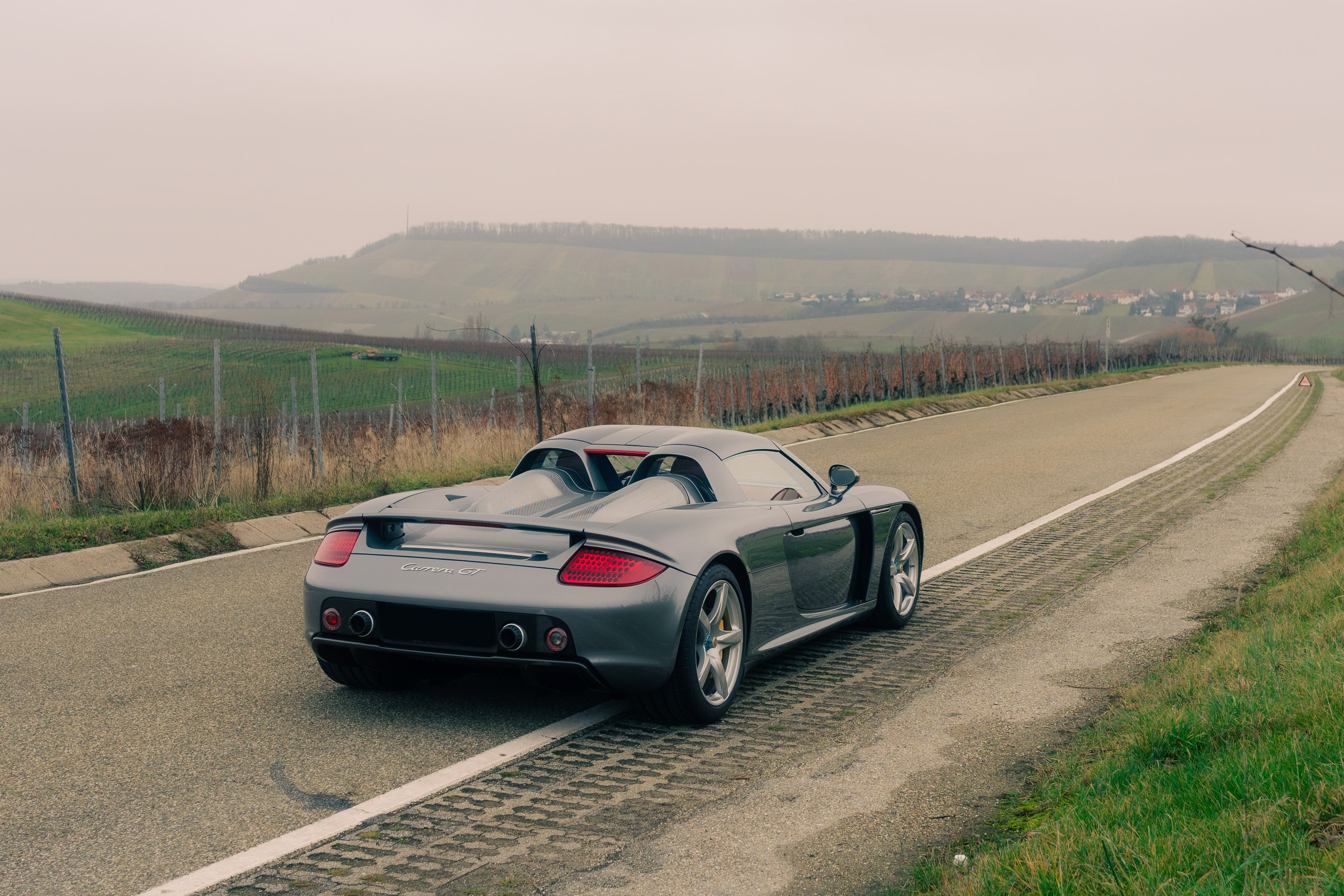 View 2004 Porsche Carrera GT (Grey) for sale exterior image (2)