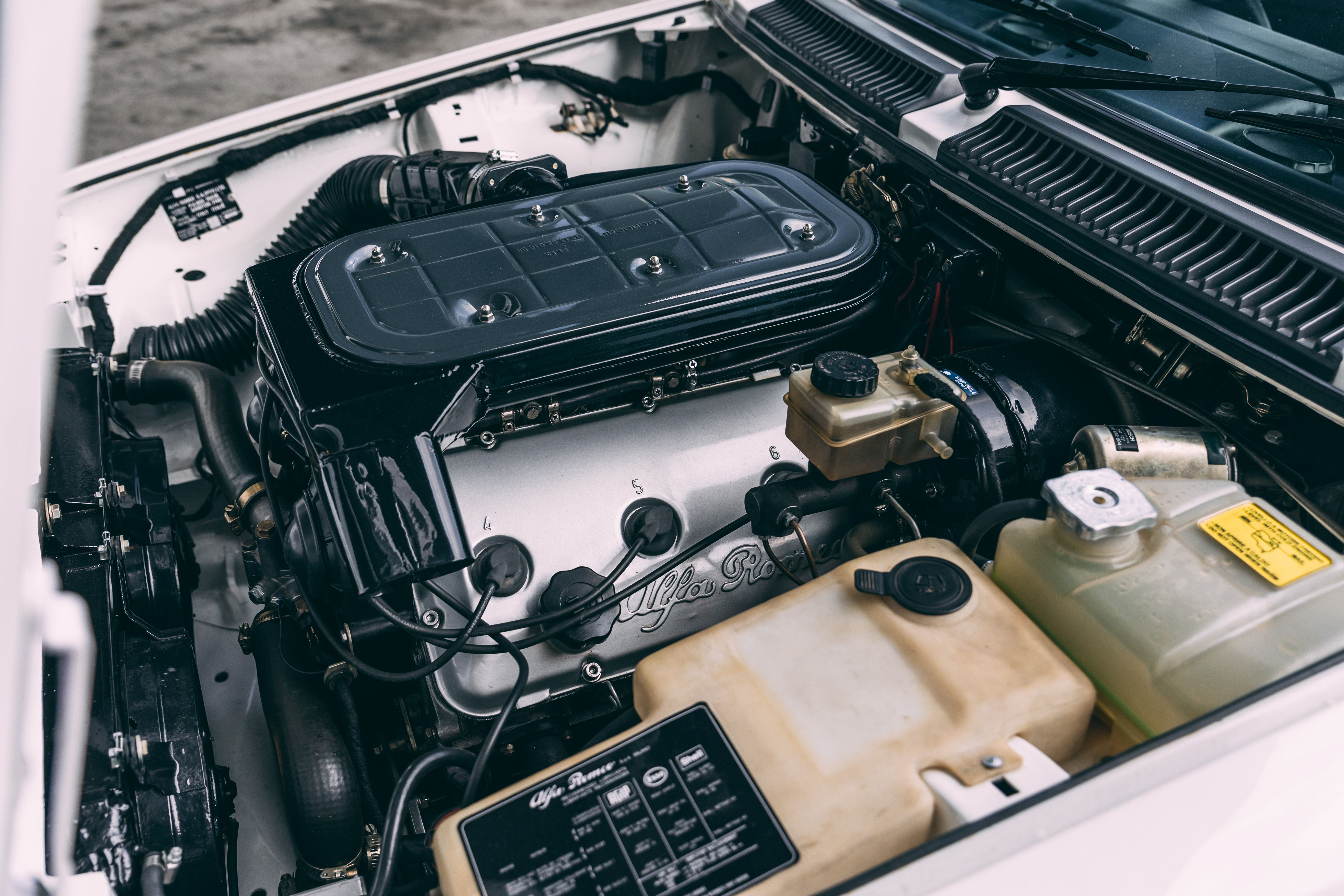 View the mechanics of the 1985 Alfa Romeo GTV6 3.0 for sale (White) (2)