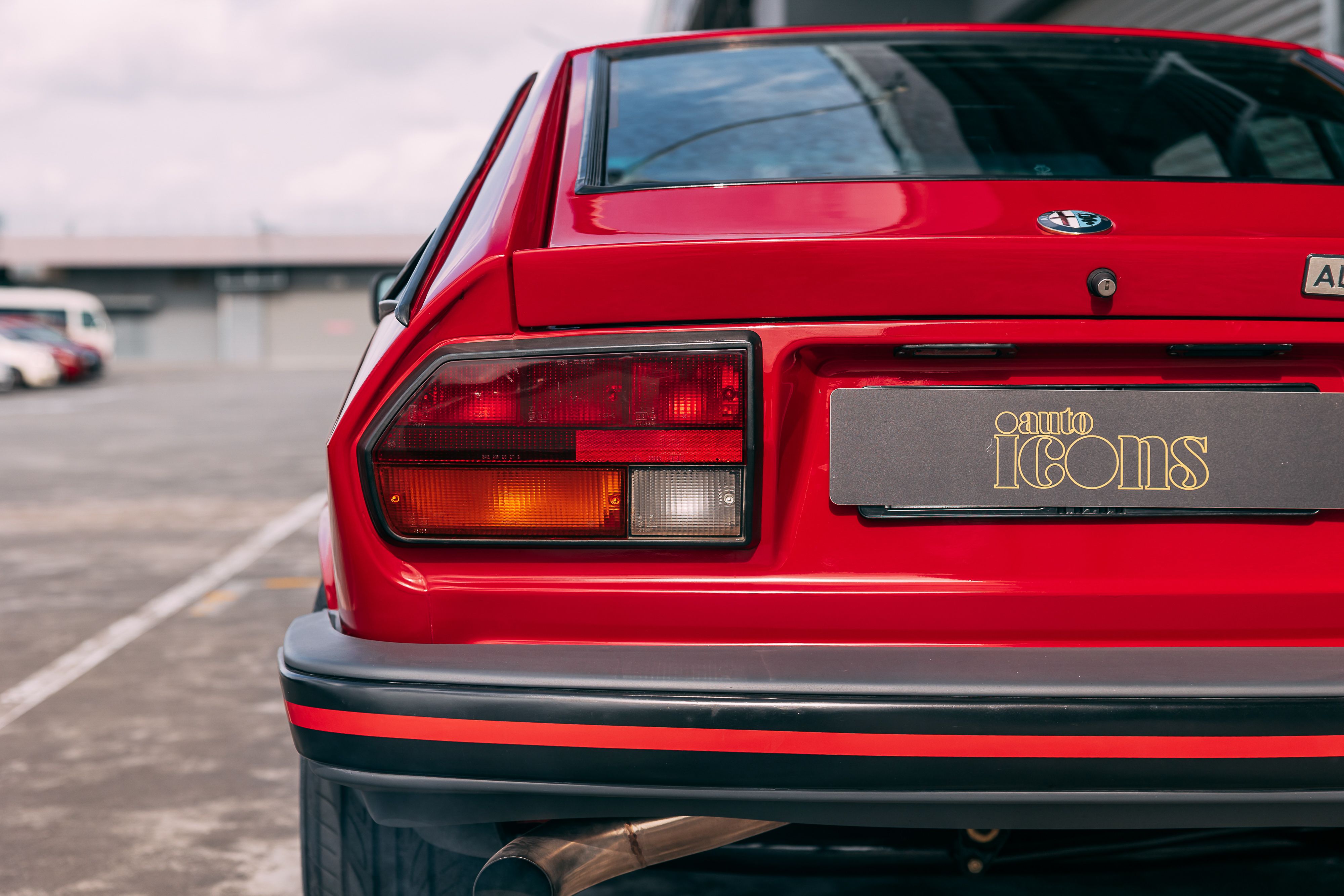View the exterior of the 1985 Alfa Romeo GTV6 3.0 for sale (Red)