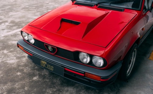 View the exterior of the 1985 Alfa Romeo GTV6 3.0 for sale (Red)