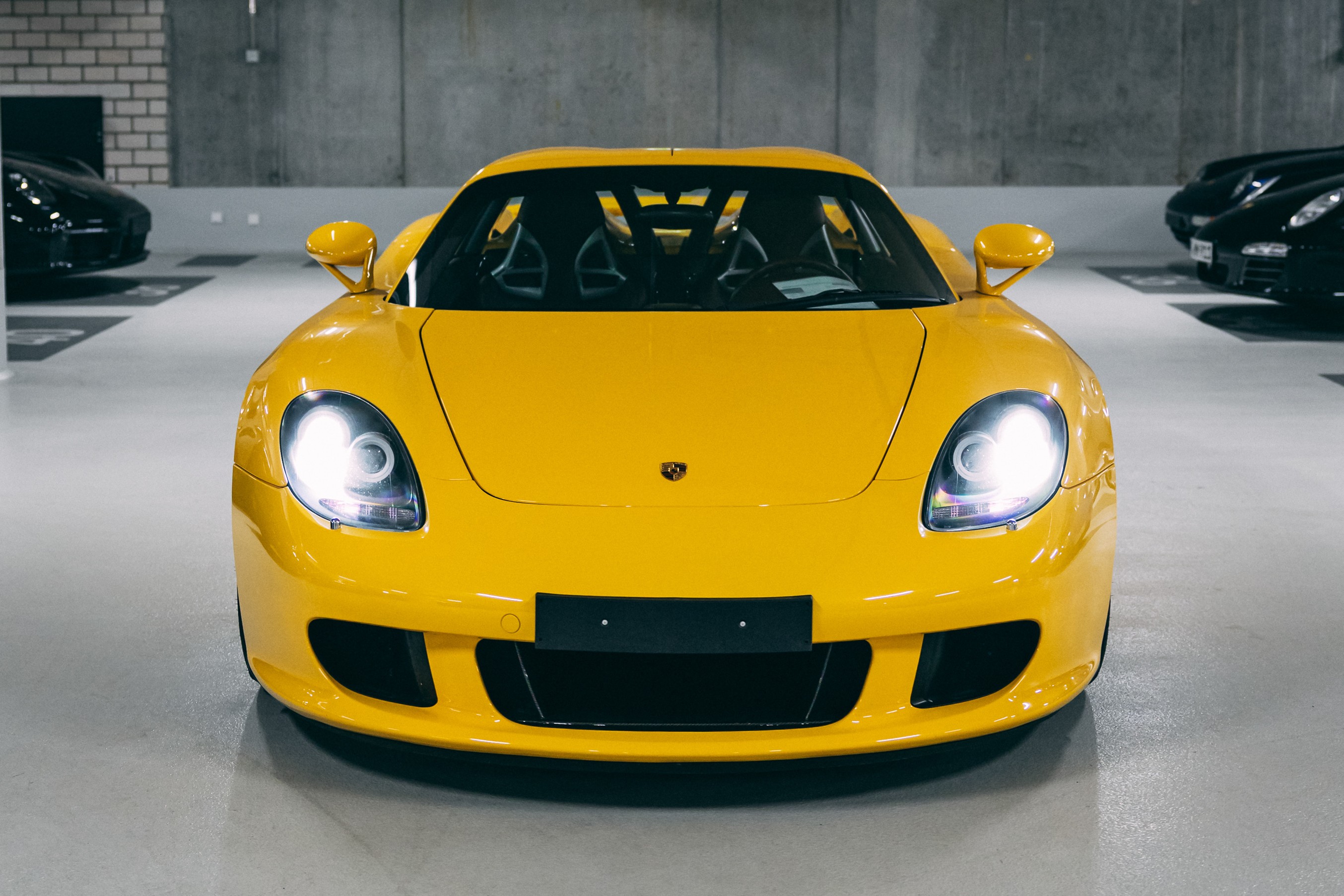 View the 2004 Porsche Carrera GT (Fayence Yellow) Exterior Front Image (1)