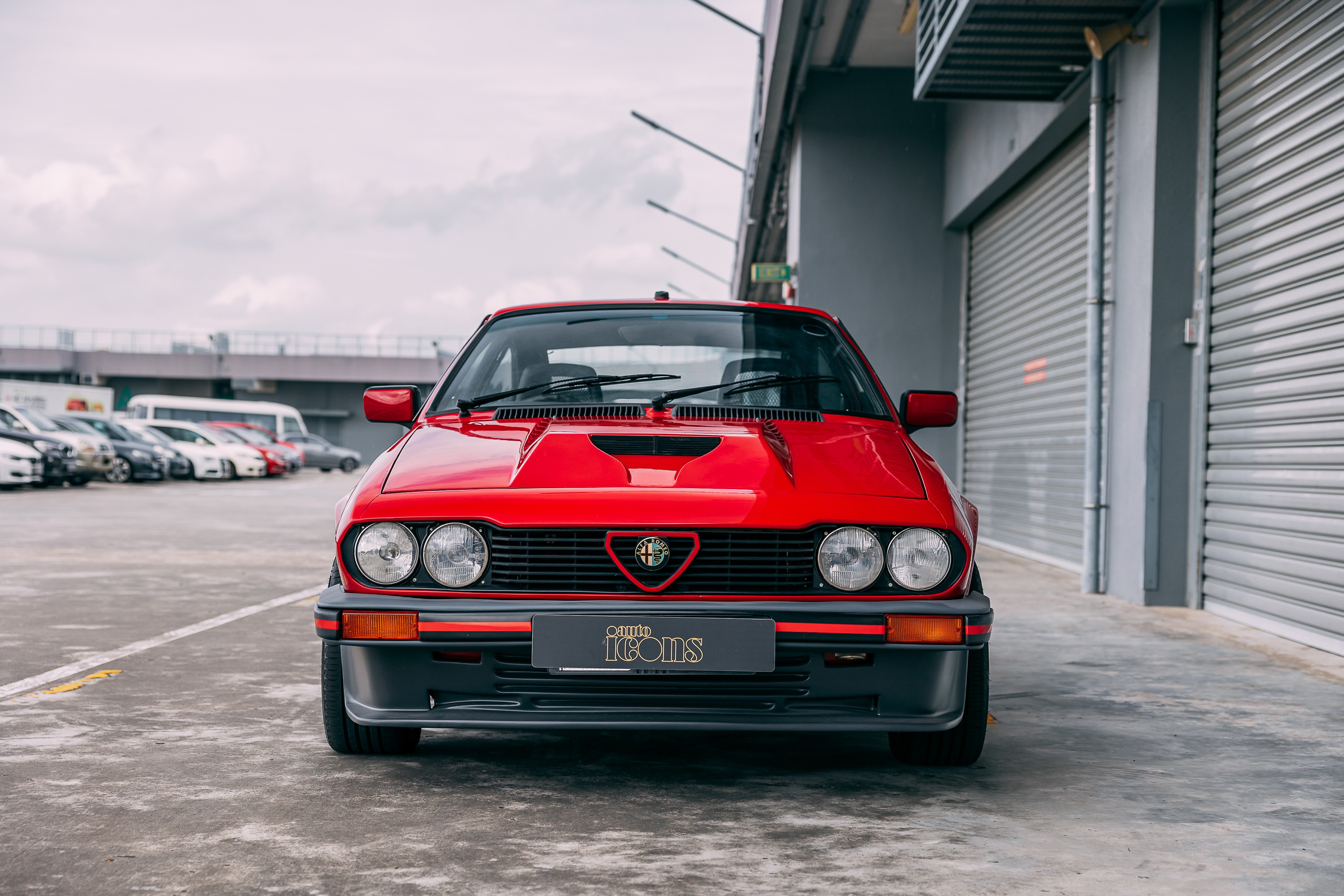 View the exterior of the 1985 Alfa Romeo GTV6 3.0 for sale (Red)