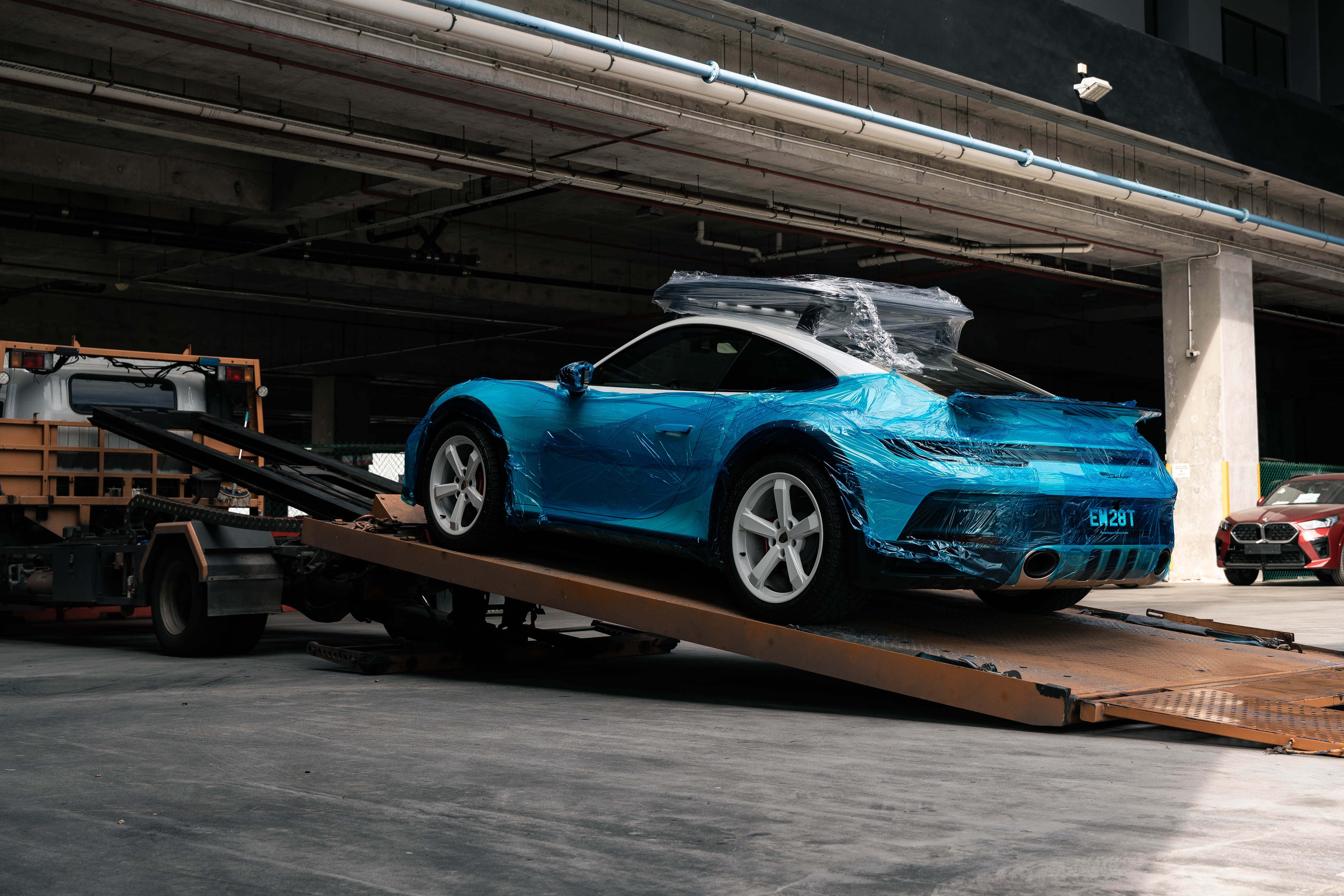 Rare and collectible car transportation and logistics services by Auto Icons