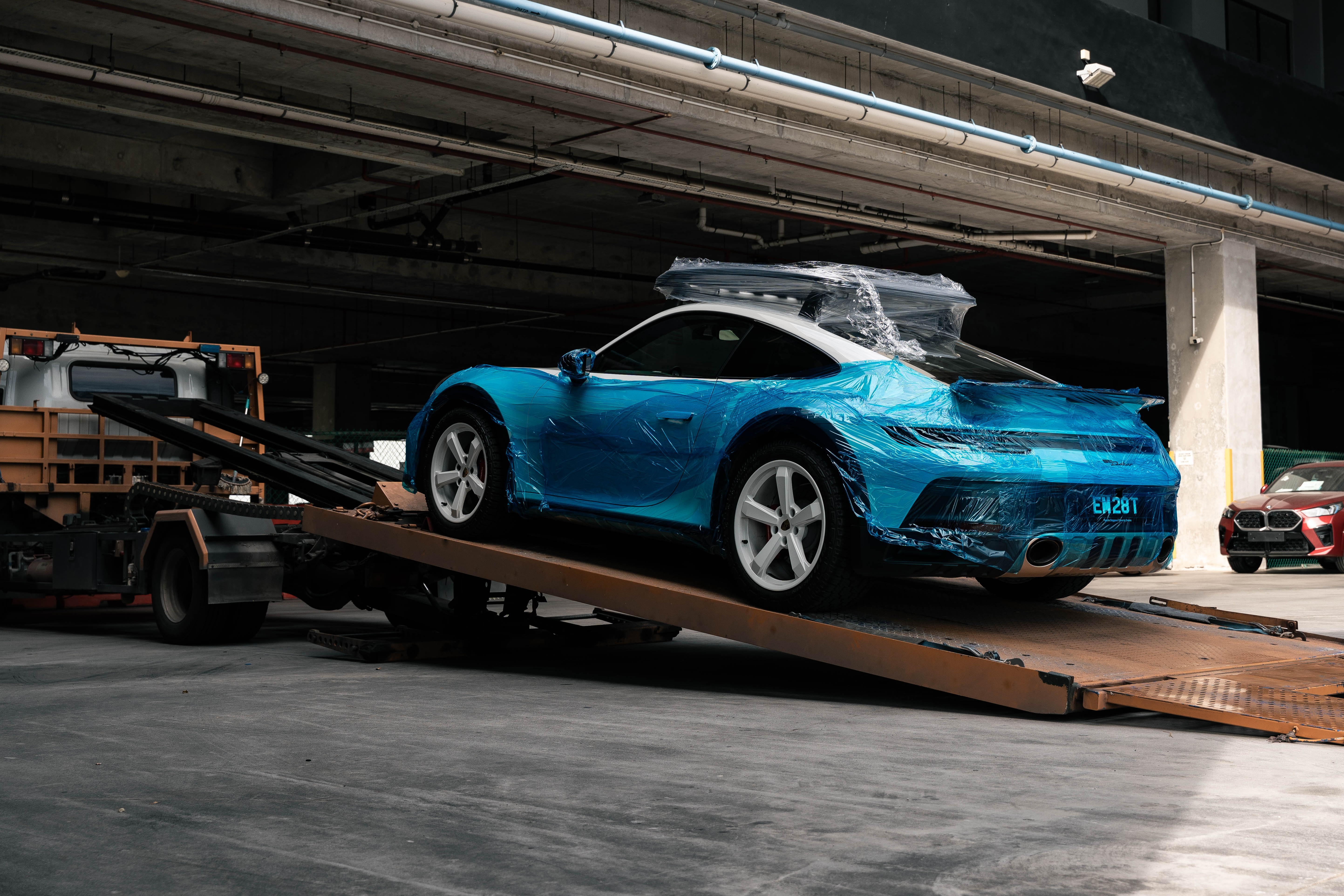 Rare and collectible car transportation and logistics services by Auto Icons