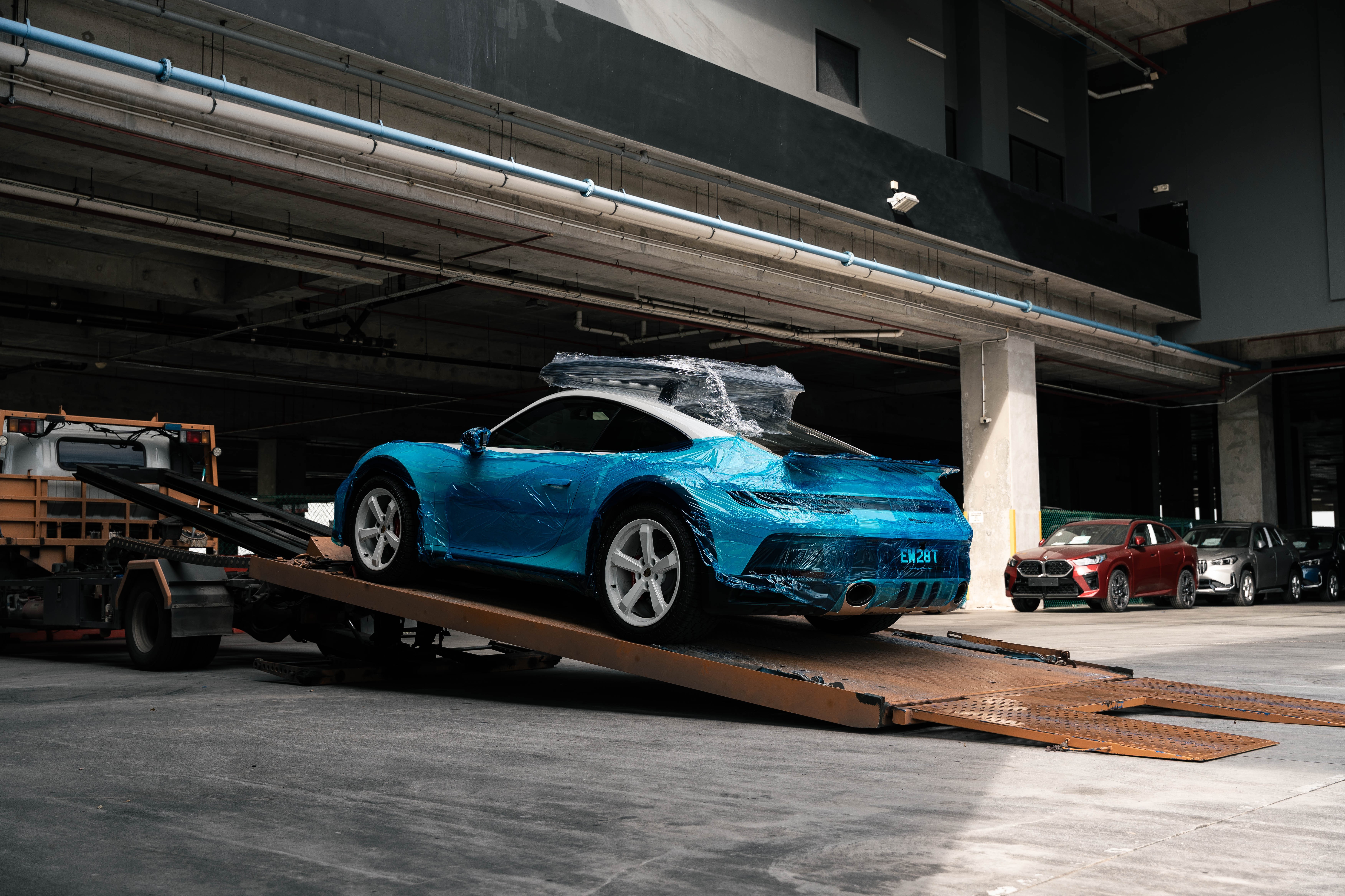 Rare and collectible car transportation and logistics services by Auto Icons