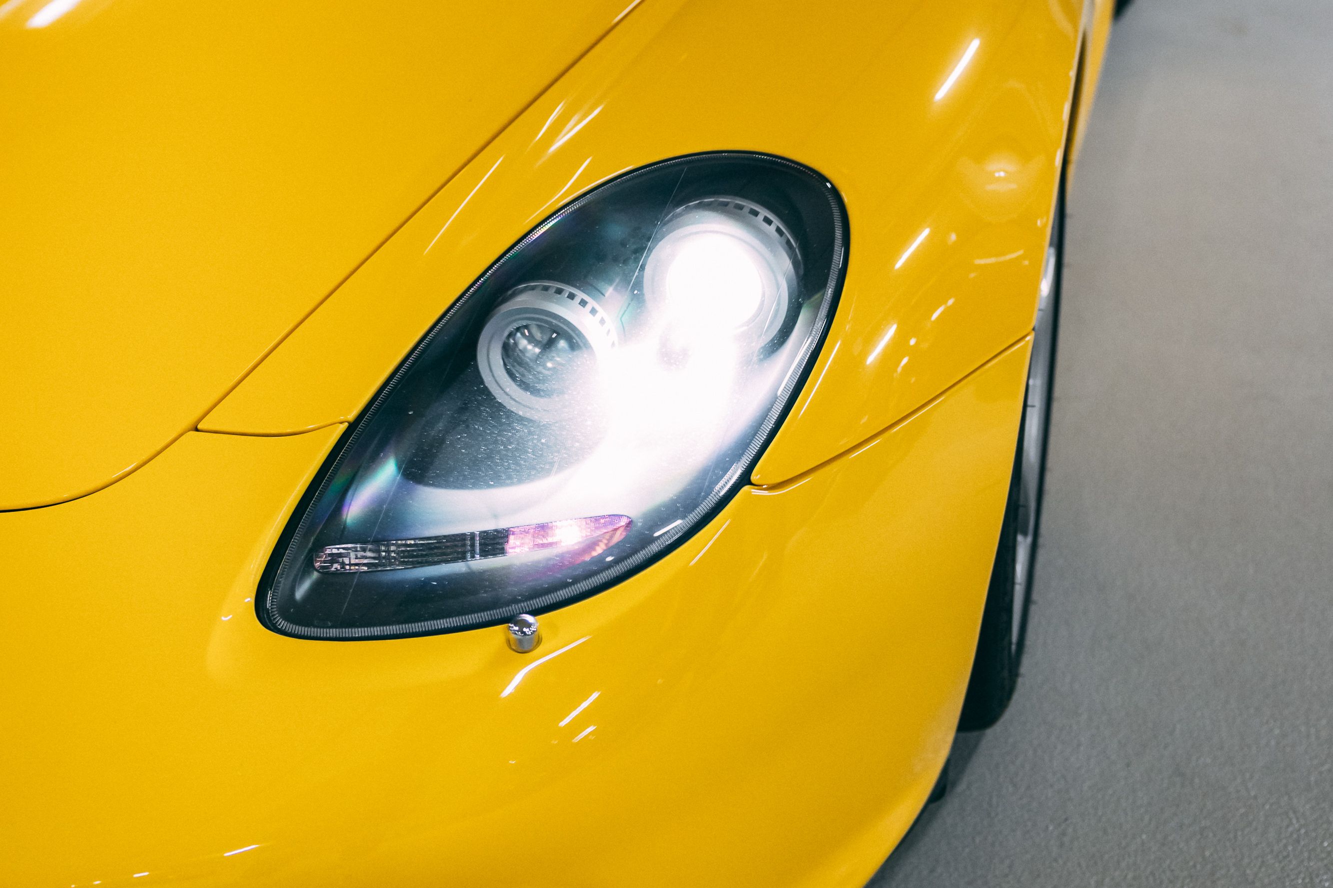 View the 2004 Porsche Carrera GT (Fayence Yellow) Exterior Front Image (3)