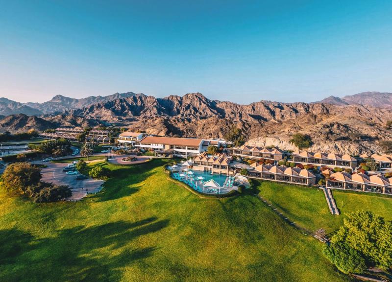 JA Hatta Fort Hotel set below rugged mountains