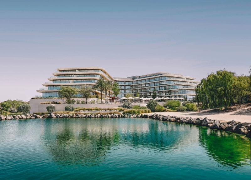 JA Beach Hotel beside a calm lagoon