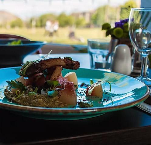 Plated dish on a table at Left Field bistro