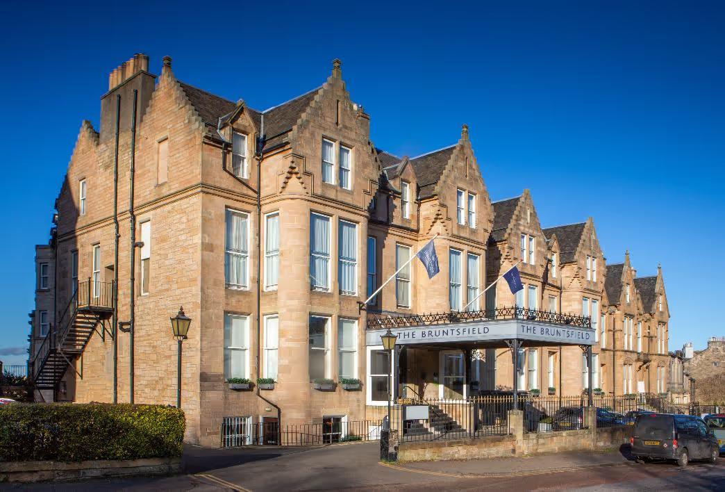 The Bruntsfield hotel's sandstone front under a blue sky