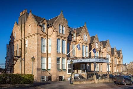 The Bruntsfield hotel's sandstone front under a blue sky