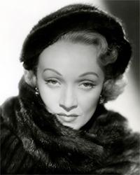 Black-and-white portrait of a woman in a fur hat and collar