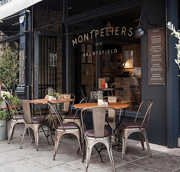 Montpeliers bar with chairs and tables outside