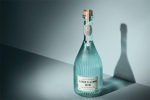 Bottle of Lind and Lime gin against a pale background