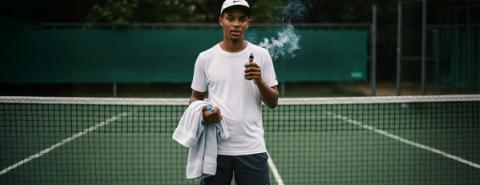 Tennis playing vaper