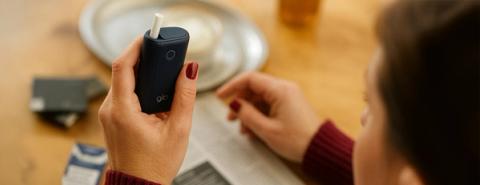 Lady-using-heated-tobacco.jpg