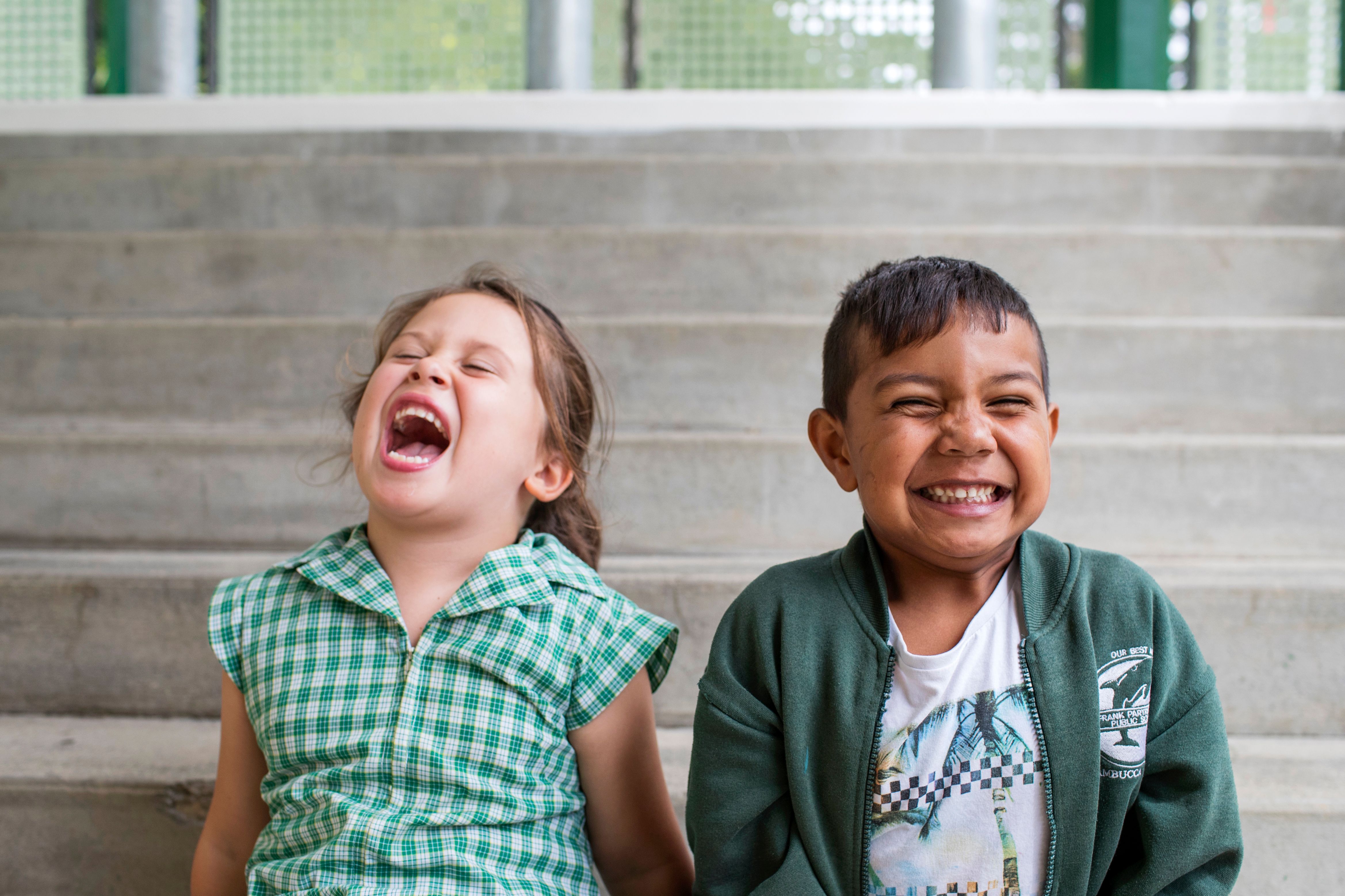 Two children laughing