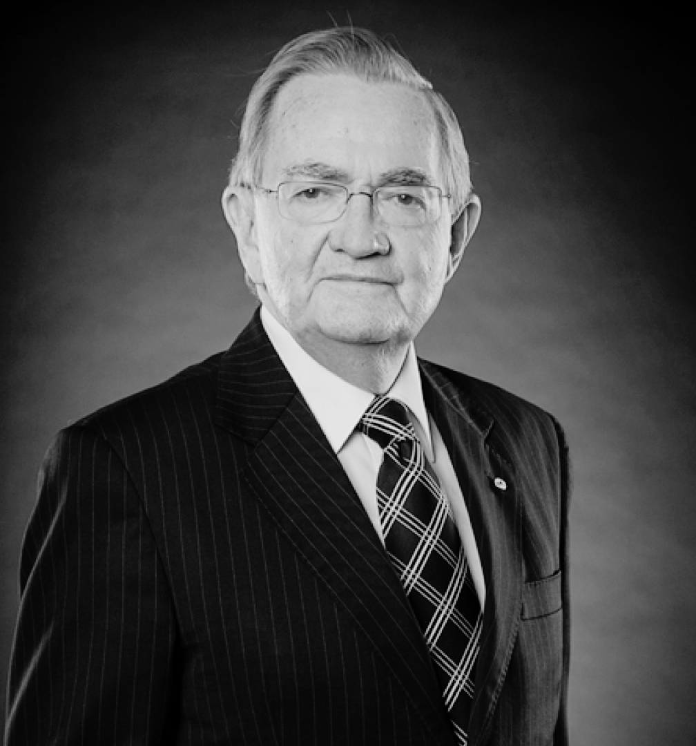 Black and white portrait photo of The Honourable Kevin E. Lindgren AM QC