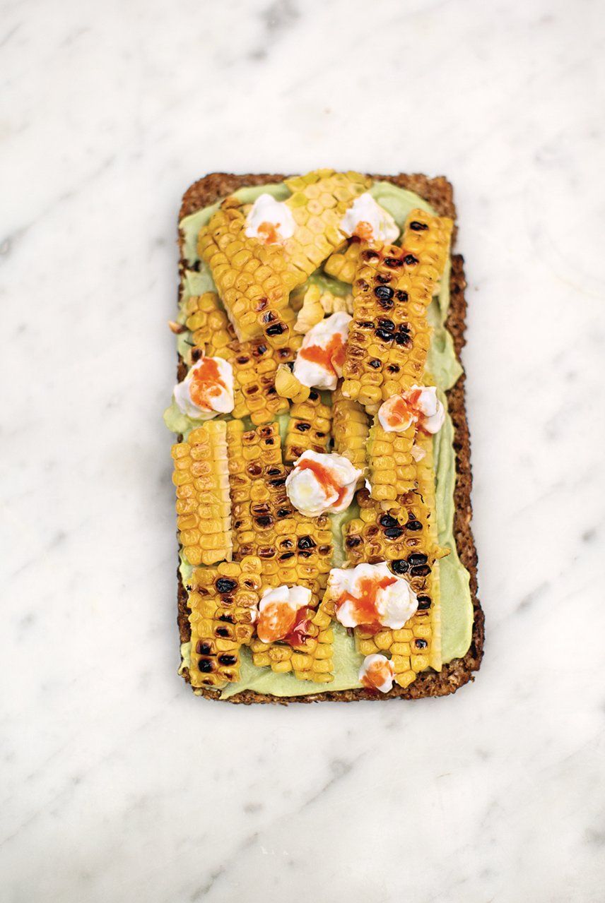 Avocado on rye toast with charred corn