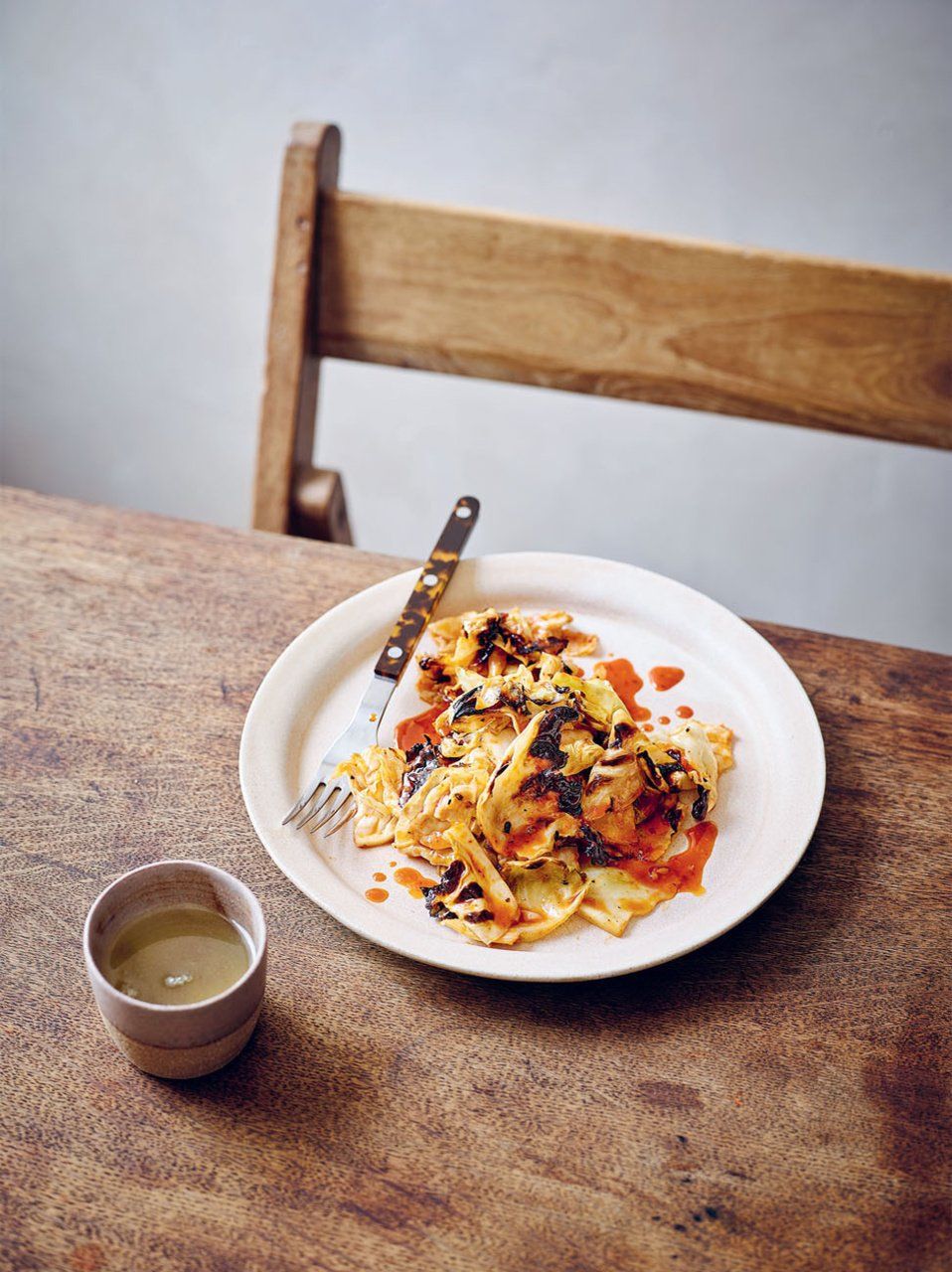 Charred cabbage in warm gochujang vinaigrette